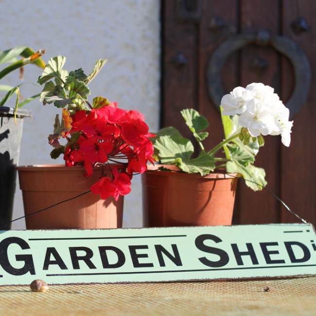 Placa de metal garden shed